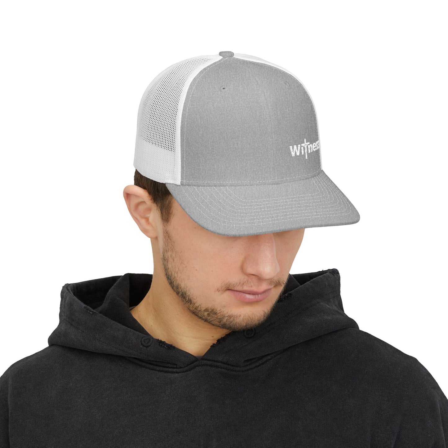 Light grey trucker hat with white mesh back and small embroidered “Witness” logo