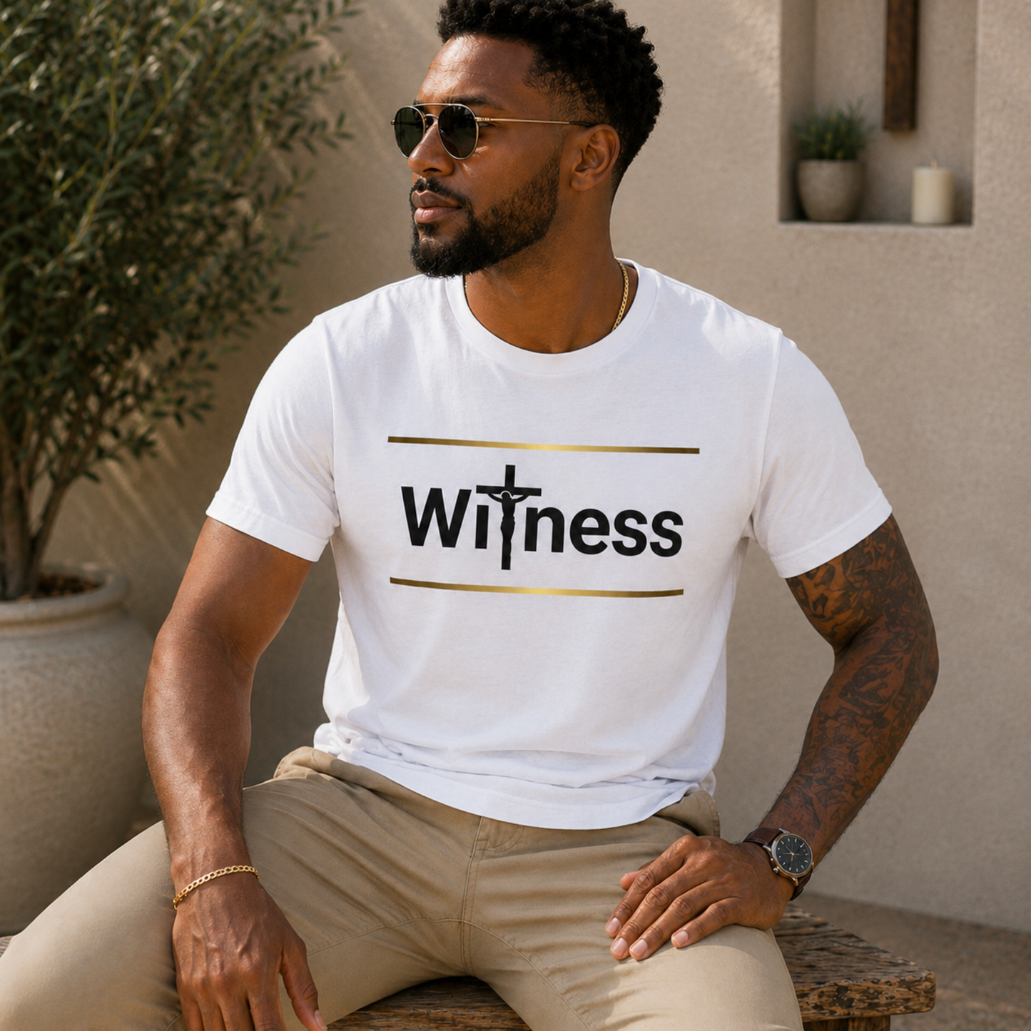 White T-shirt with gold stripe logo and cross graphic on chest