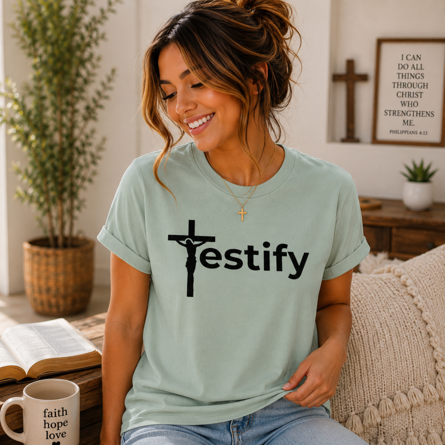 Mint Christian T-shirt with black cross and “Testify” front graphic.