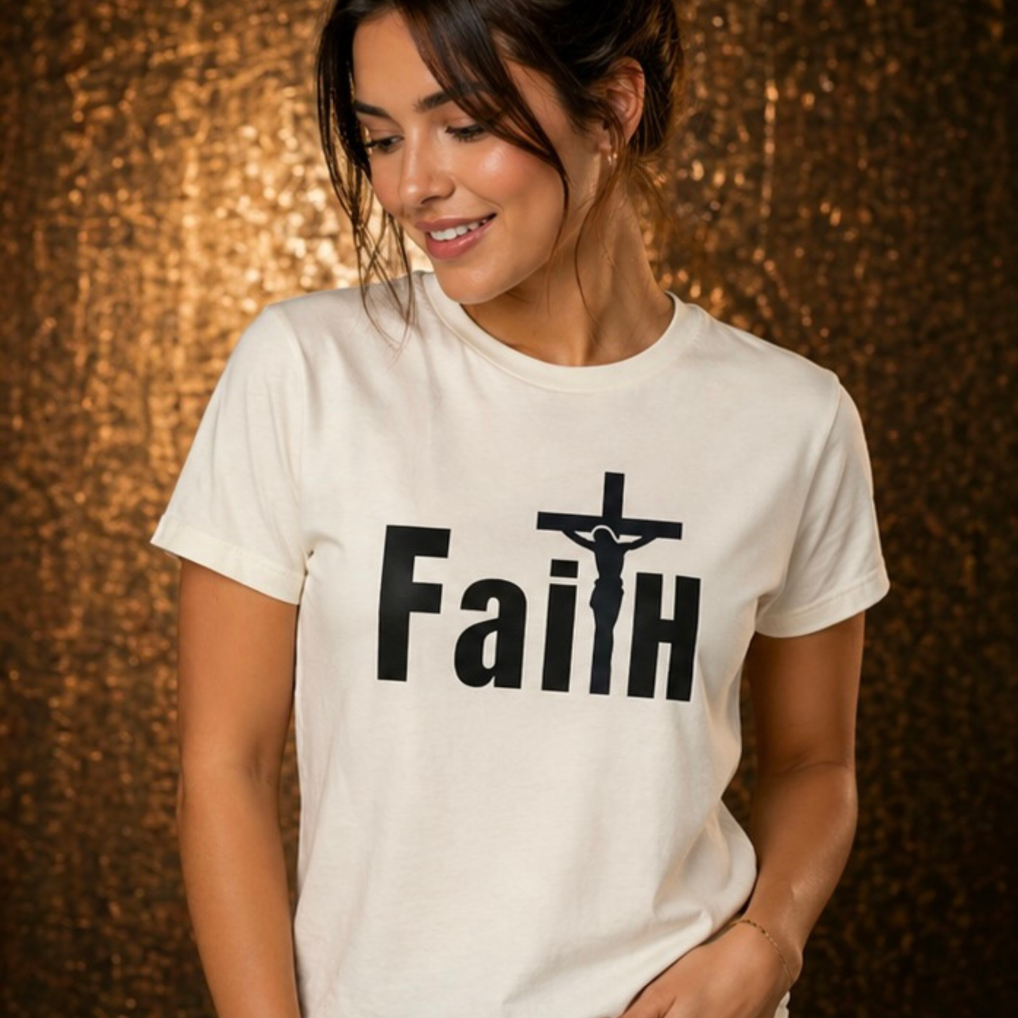 White crew-neck T-shirt with centered black 'Faith' and cross graphic, short sleeves.