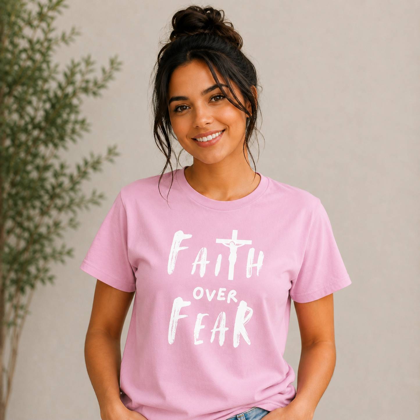 Blossom pink short-sleeve T-shirt with white 'Faith over Fear' cross graphic