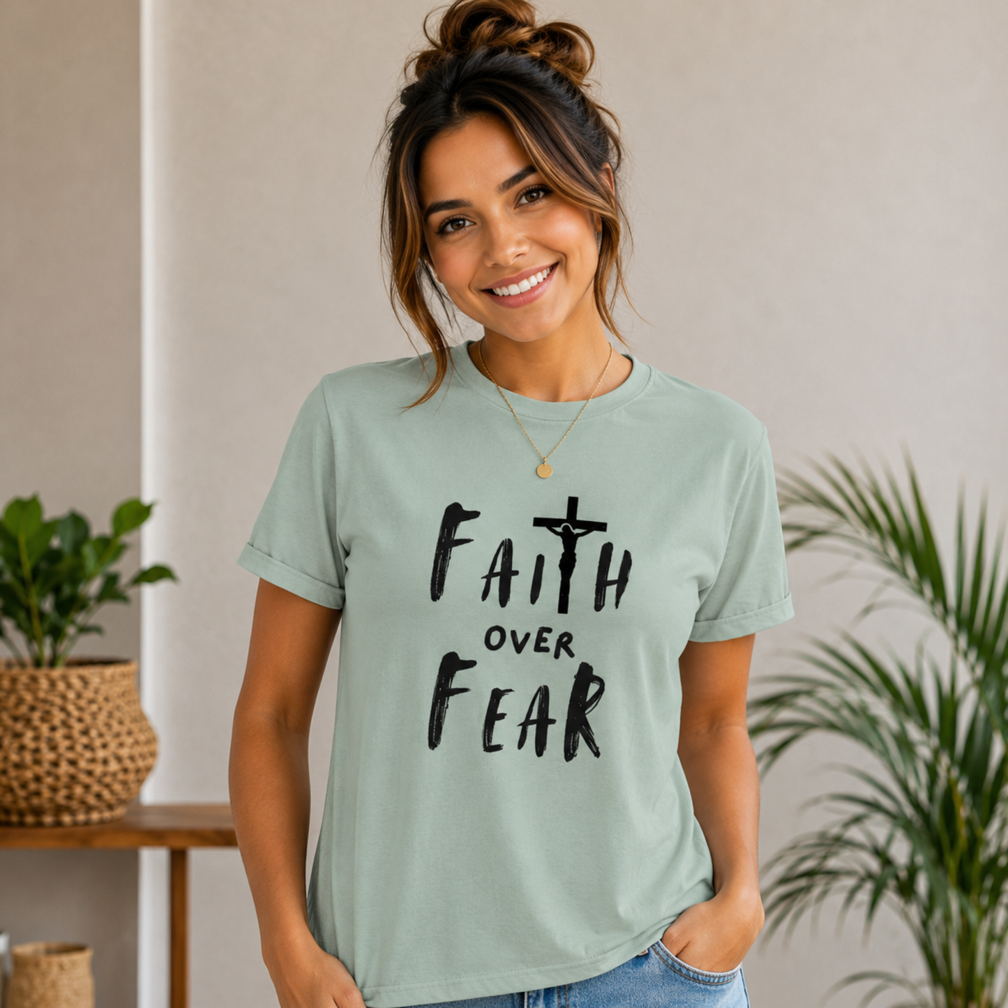 Mint green Christian T-shirt with black cross and 'Faith over Fear' statement print