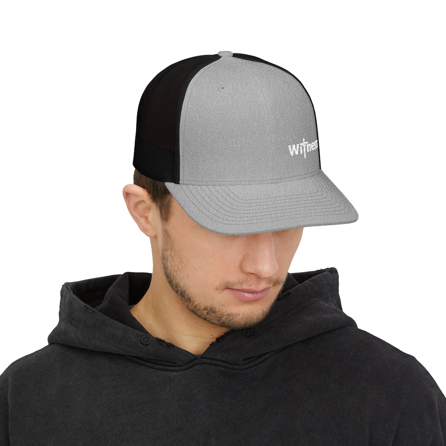 Heather gray trucker cap with black panel, embroidered Witness logo, adjustable strap